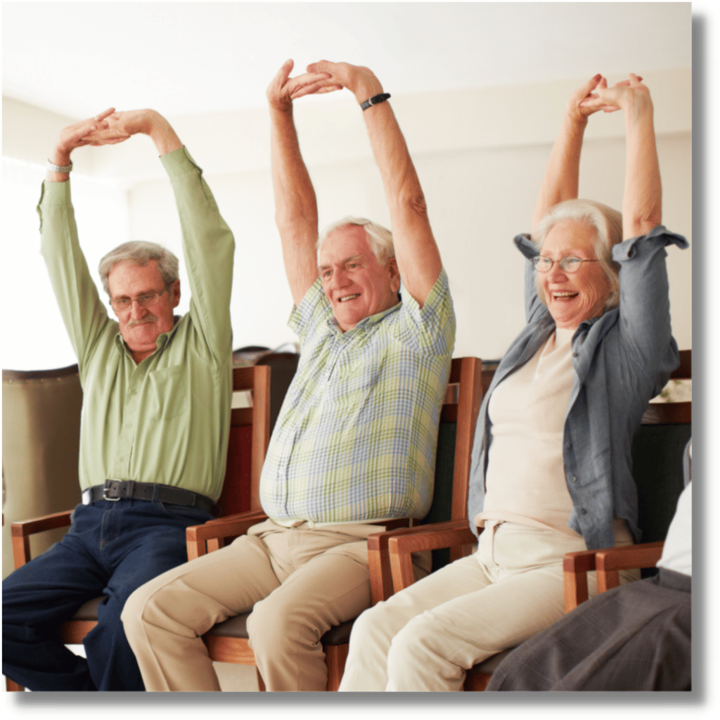 elderly stretching while sitting