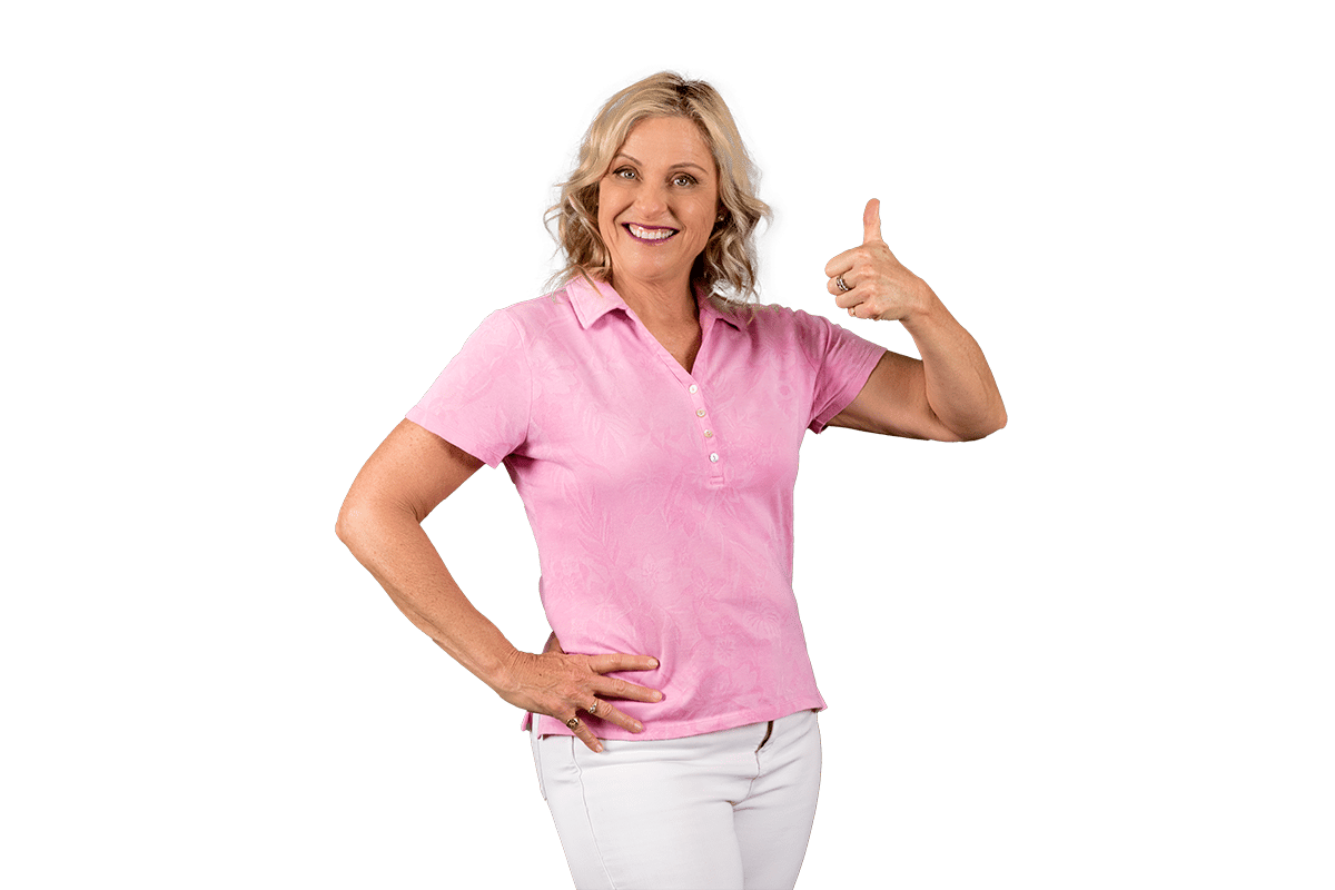 Paula Nutting, Your musculoskeletal specialist, wearing a pink blouse smiling with a thumbs up